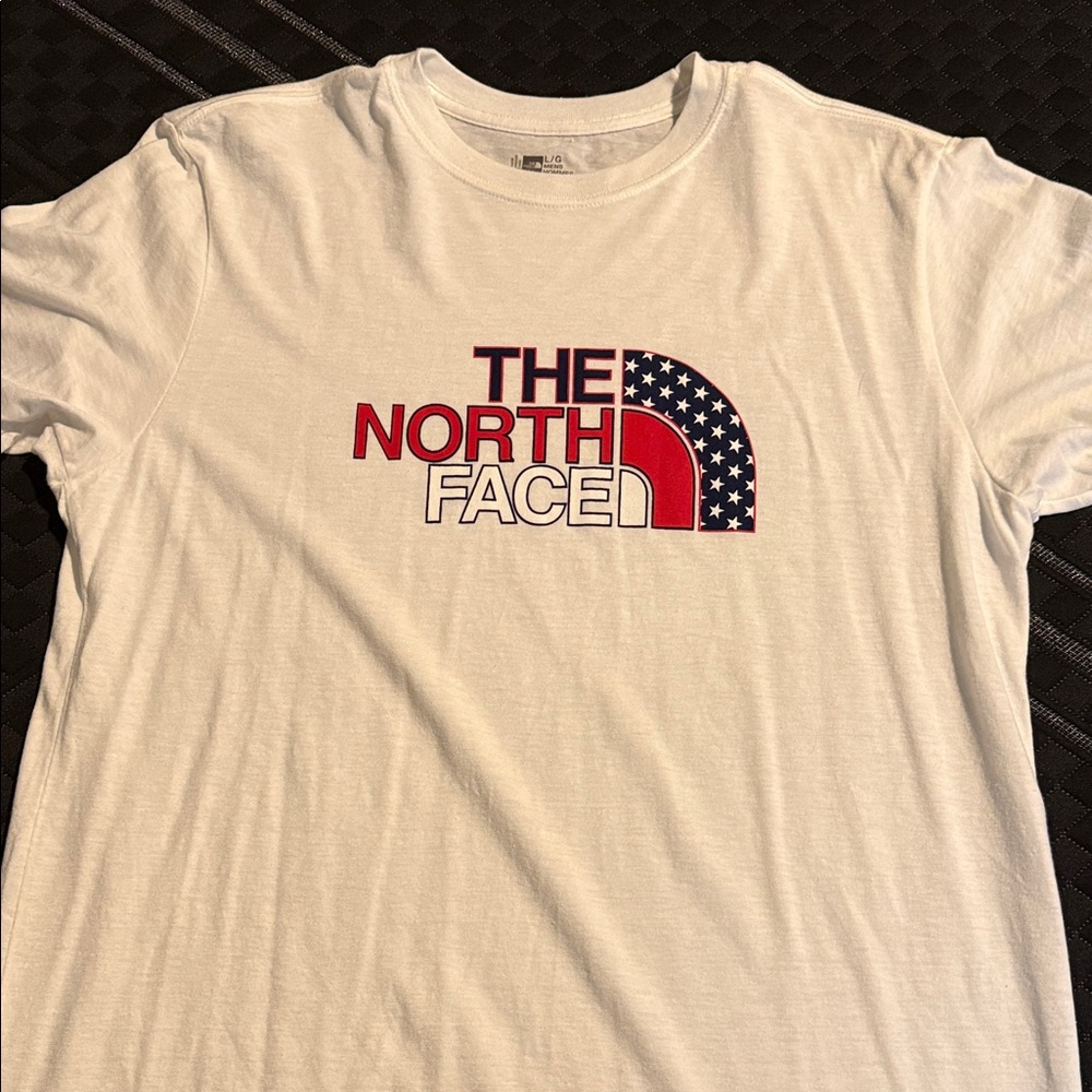 The North Face Men’s White Tee with Red & Blue American Flag Logo